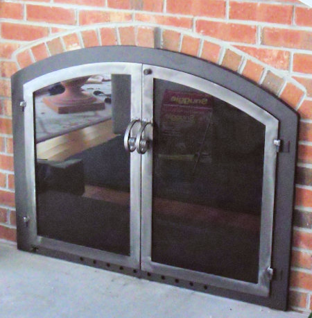  Nantucket Arch Black frame with twin doors & standard forged handles. Comes with standard smoked glass and gate mesh.